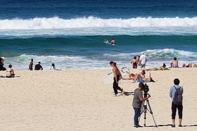 Bondi Beach Walking Tour with Optional Bondi to Bronte Coastal Walk - Bondi Rescue filming spots and lifeguard meet potential