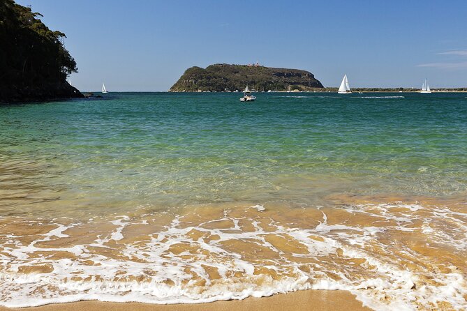 Central Coast Private Day Tour | Beaches, Bays and Wildlife & Reptile Park Entry - Norah Head Lighthouse: heritage views, ocean walks, and whale-season drama