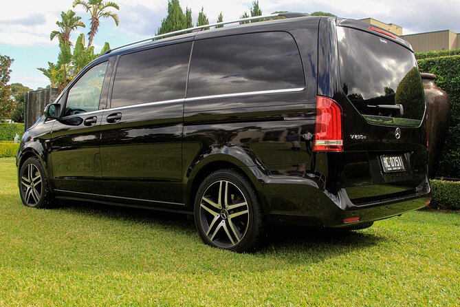 Luxury Van - Sydney Airport Private Arrival Transfer - Price and value: $176.84 for up to 6 people
