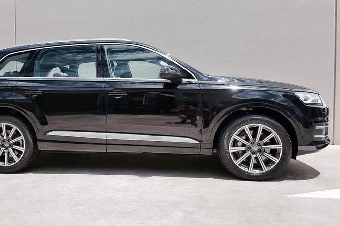 Luxury Van - Sydney Airport Private Departure Transfer - The ride itself: European sedan or SUV, plus small comforts