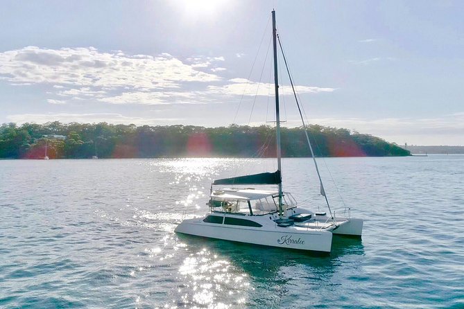 Private Catamaran Hire on Sydney Harbour - Cruising under the Harbour Bridge for the best photo angles