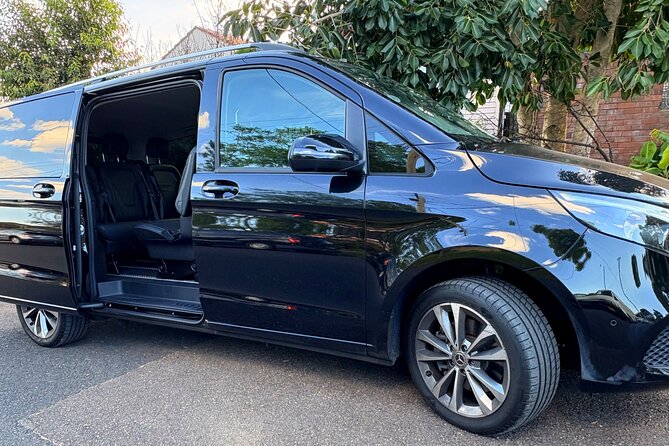 Private Chauffeur Transfer from Sydney Airport to Sydney City - Pickup that actually finds you: arrivals hall, name sign, and delays