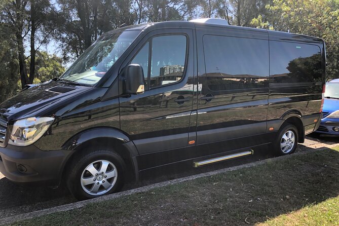 Private Transfer FROM Sydney Airport to Sydney CBD 1 to 5 people - Air-Conditioned Comfort, Tinted Windows, and Professional Drivers