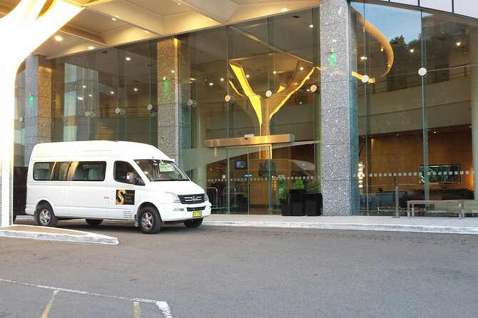 Sydney Airport to Sydney CBD shared ride seat in vehicle shuttle transfer - Sydney Airport to CBD Shuttle: What This Transfer Is Really Like