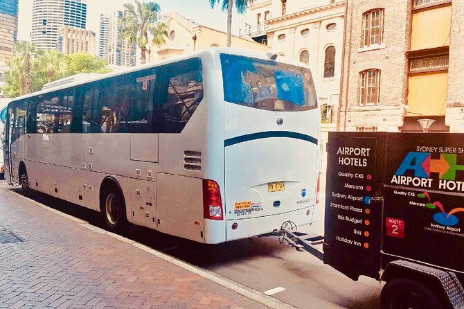 Sydney Airport to Sydney CBD shared ride seat in vehicle shuttle transfer - Shared Shuttle Comfort: Air Conditioning, Timing, and How the Ride Feels