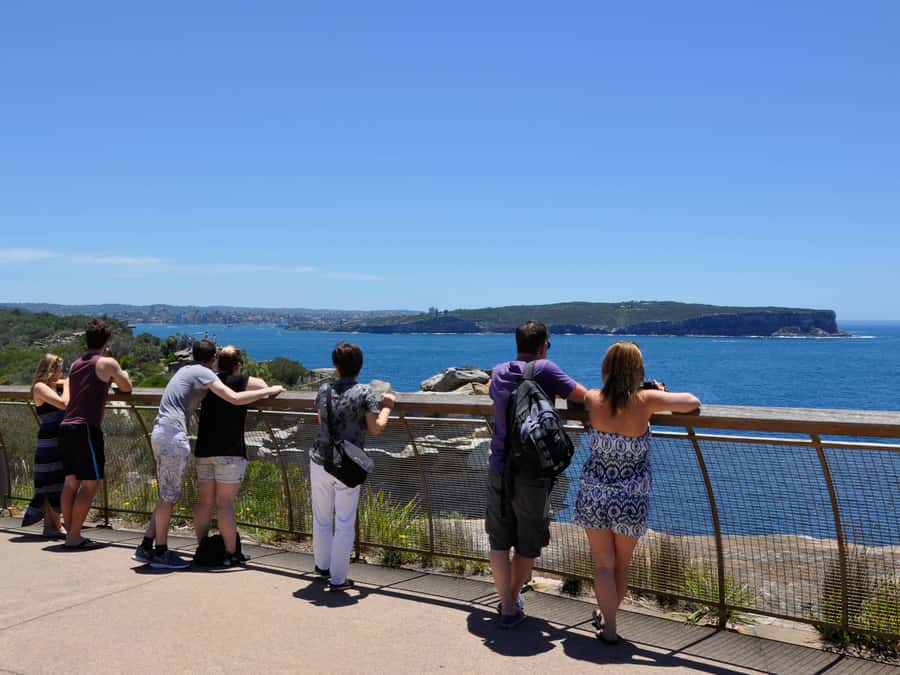 Sydney: City Highlights Guided Bus Tour - How the ride feels: air-conditioned comfort and a guide who keeps you moving