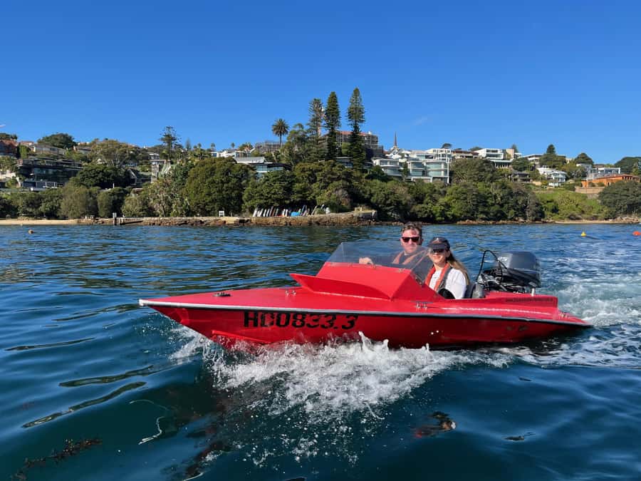 Sydney: Guided Sydney Harbour Grand Tour (self drive) - What you actually get on board: life vest, waterproof bag, ponchos