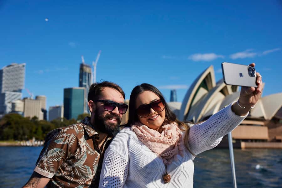 Sydney: Morning Sightseeing Bus to Bondi with Lunch Cruise - The Rocks pass-by: sandstone warehouses and quick orientation