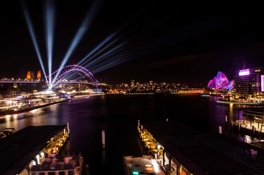 Sydney: Vivid Festival of Light Harbor Cruise with Dinner - The onboard vibe: welcome drink, music, and the cash bar